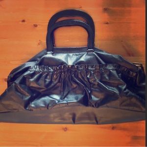 Authentic Prada Mui Mui 100% leather tote.Vintage, like new. Soft leather